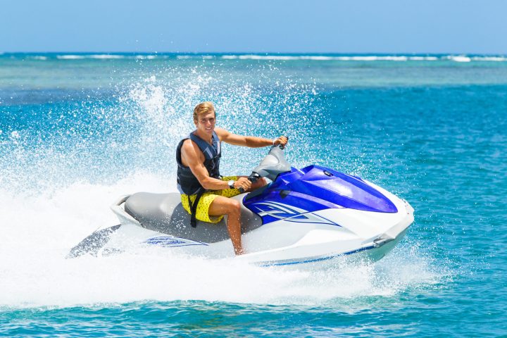 Young Man on Jet Ski in the waters