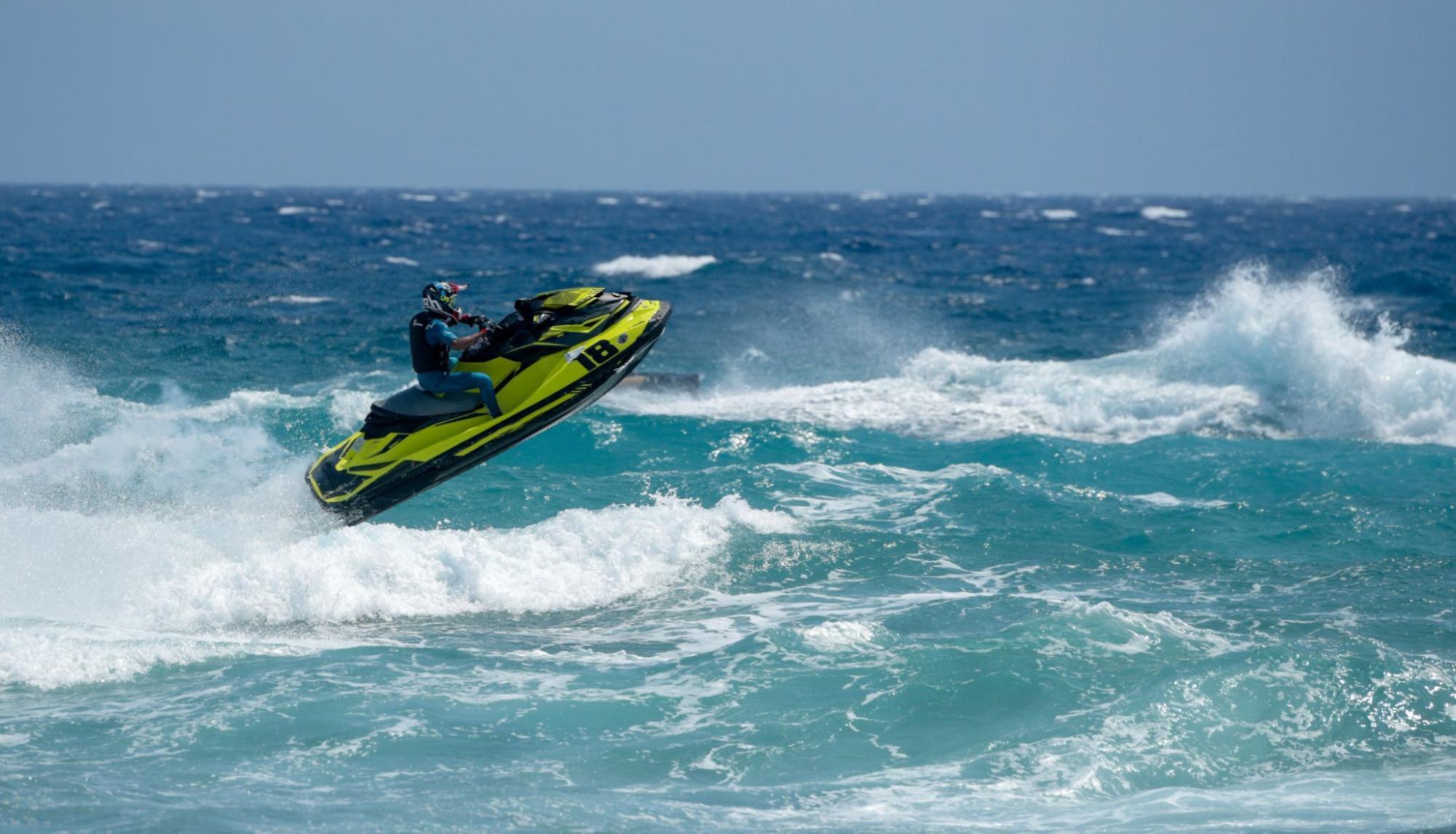 image3_faed16 A wave runner catches air off an ocean wave.